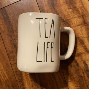 Rae Dunn “Tea Life” mug. Yellow inside.